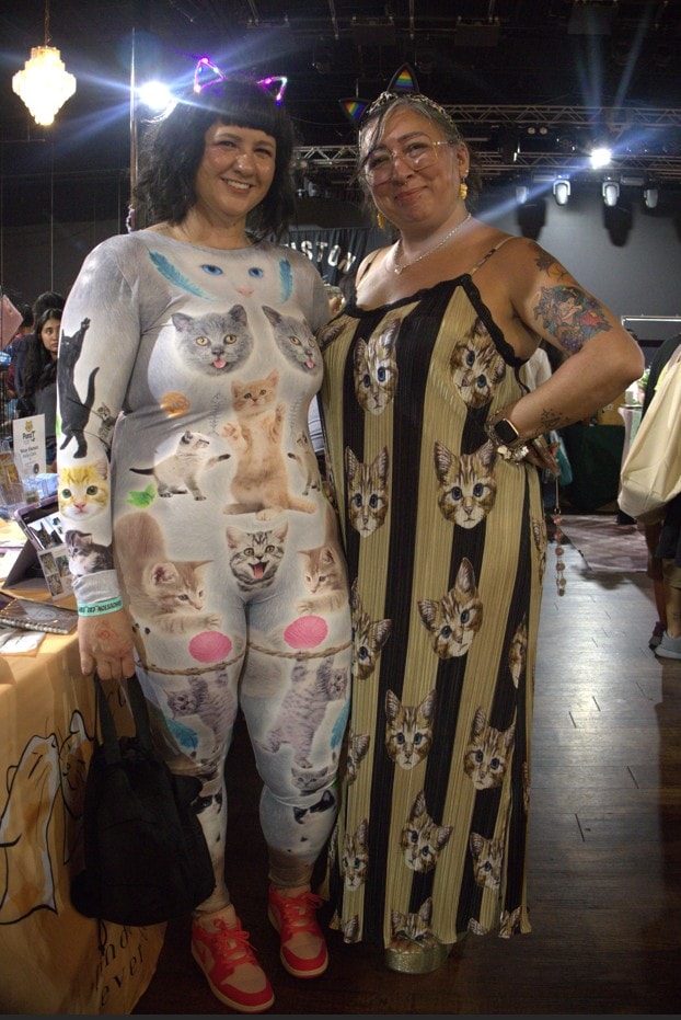 Best dressed attendees? These two came ready in full cat-print looks