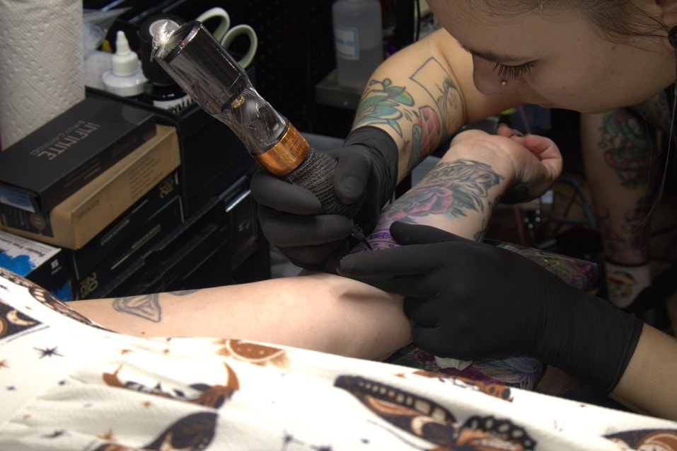 Getting some fresh ink at Houston Cat Expo — a purr-manent memory